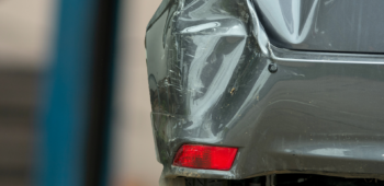 Image Calculating the Cost of Repairing a Dented Car